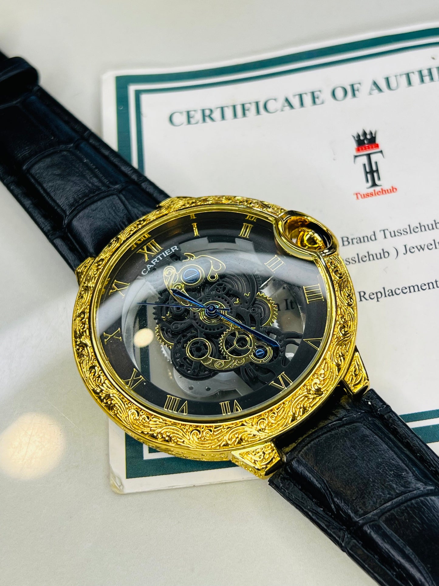 Black Gold Engraved Skeleton Dial Watch