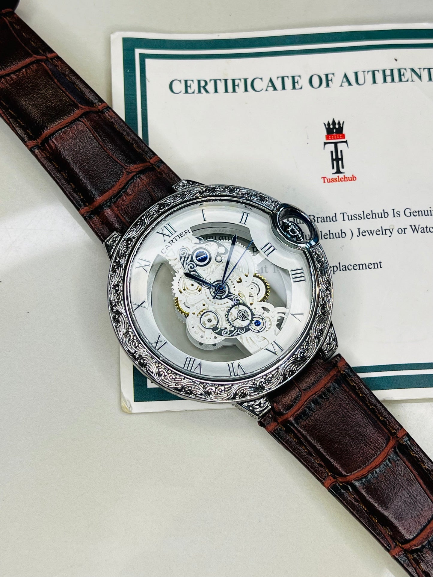 Brown Silver Engraved Skeleton Dial Watch