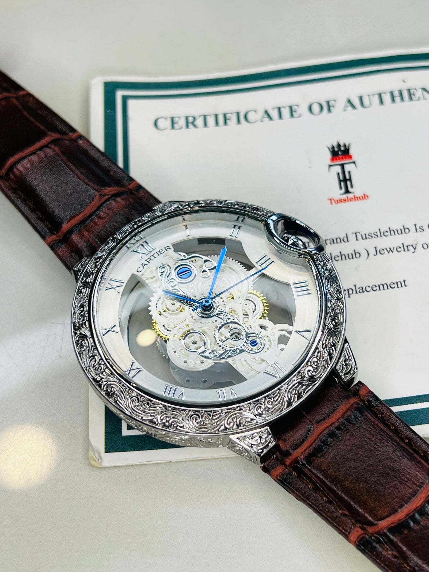Brown Silver Engraved Skeleton Dial Watch
