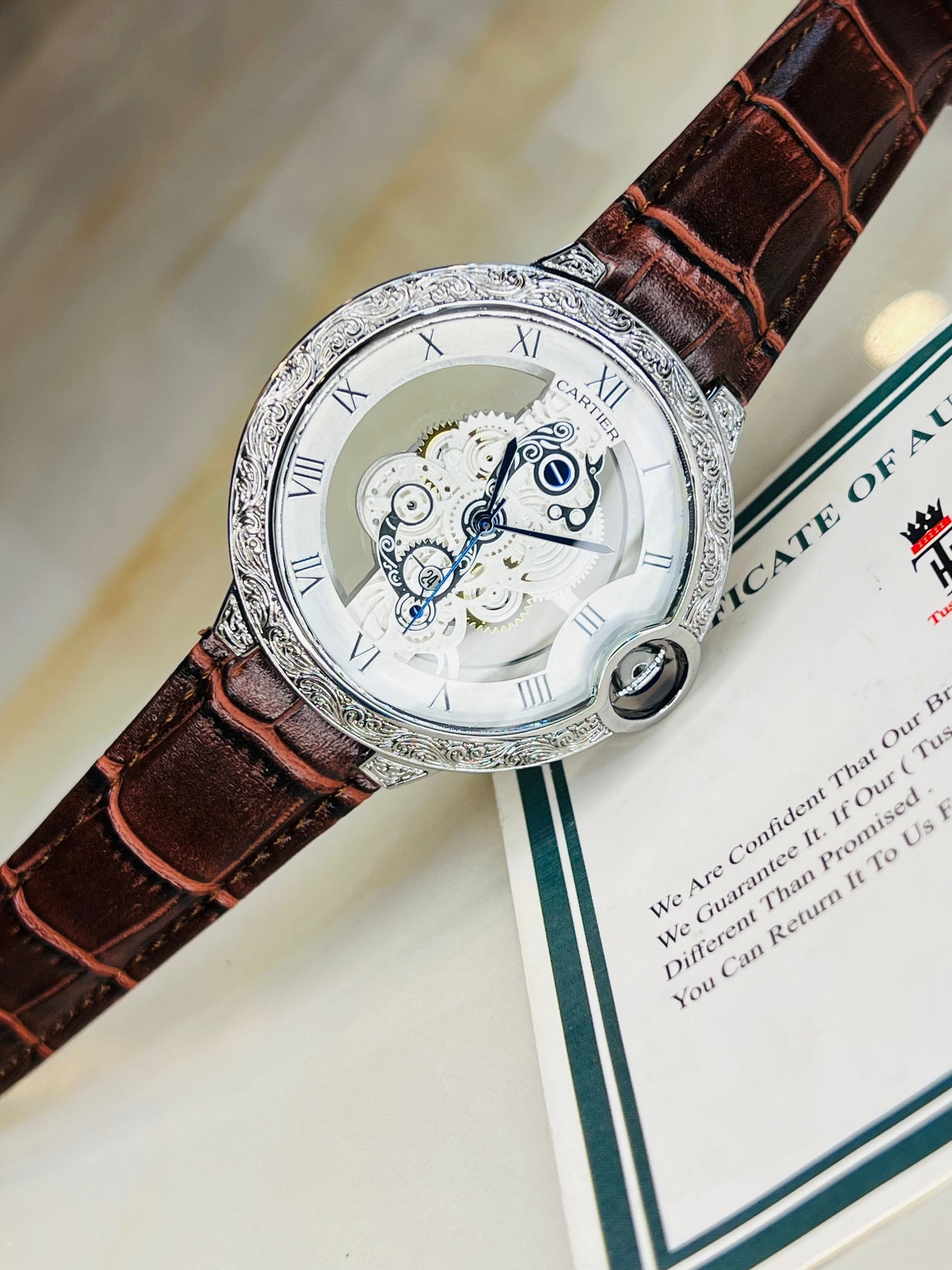 Brown Silver Engraved Skeleton Dial Watch