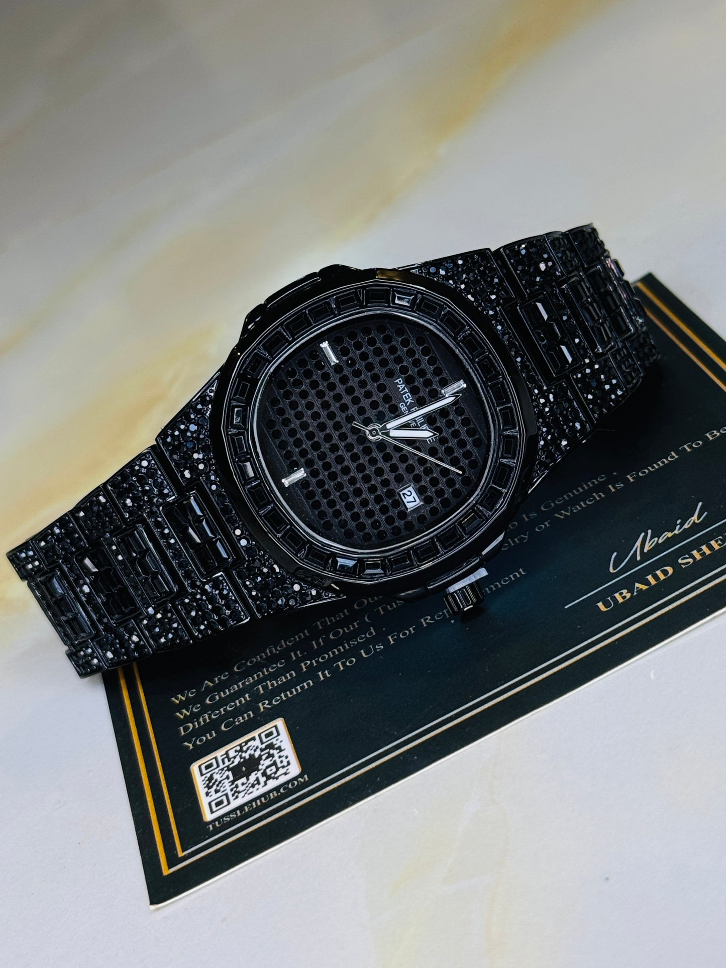 All Black Iced Out Nautilus Watch